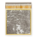 Archivist Matches with a forest design on the box and a gold frame around the design