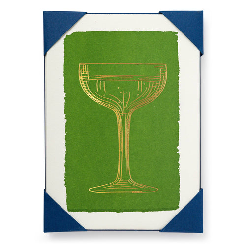 An Archivist Holiday card set with a gold champagne glass illustration on a green background