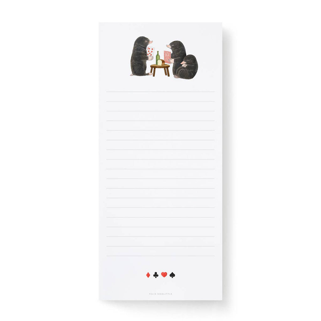 A tall white lined Felix Doolittle notepad with a small illustration of three moles sitting around a table playing cards at the top and small card suit icons along the bottom edge.