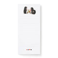 A tall white lined Felix Doolittle notepad with a small illustration of three moles sitting around a table playing cards at the top and small card suit icons along the bottom edge.
