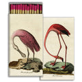 Matchbox with illustrations of a roseate spoonbill and a red flamingo on a white background