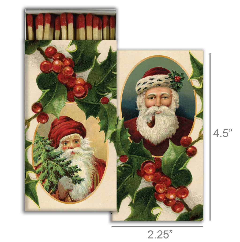 Matchbox with vintage-style Santa Claus illustration and holly design.