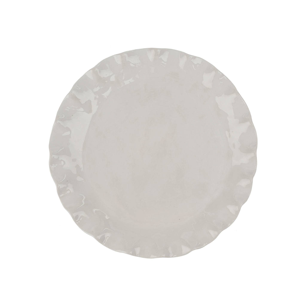 A round white Calypso plate with a scalloped, ruffled edge, shown from a top-down view on a solid white background.