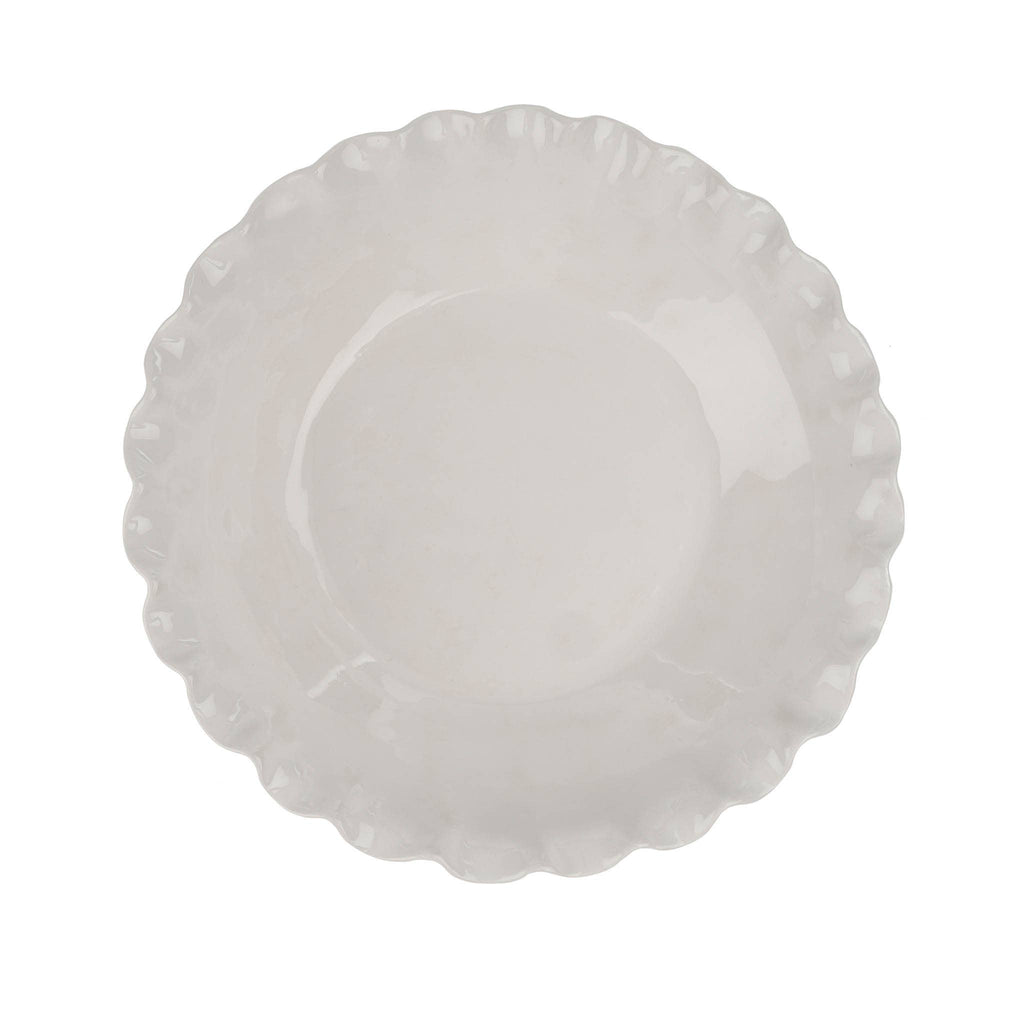 White ceramic Calypso serving bowl with decorative edge on a white background