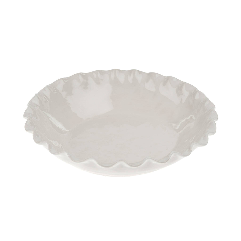 White ceramic Calypso serving bowl with scalloped edge on a white background