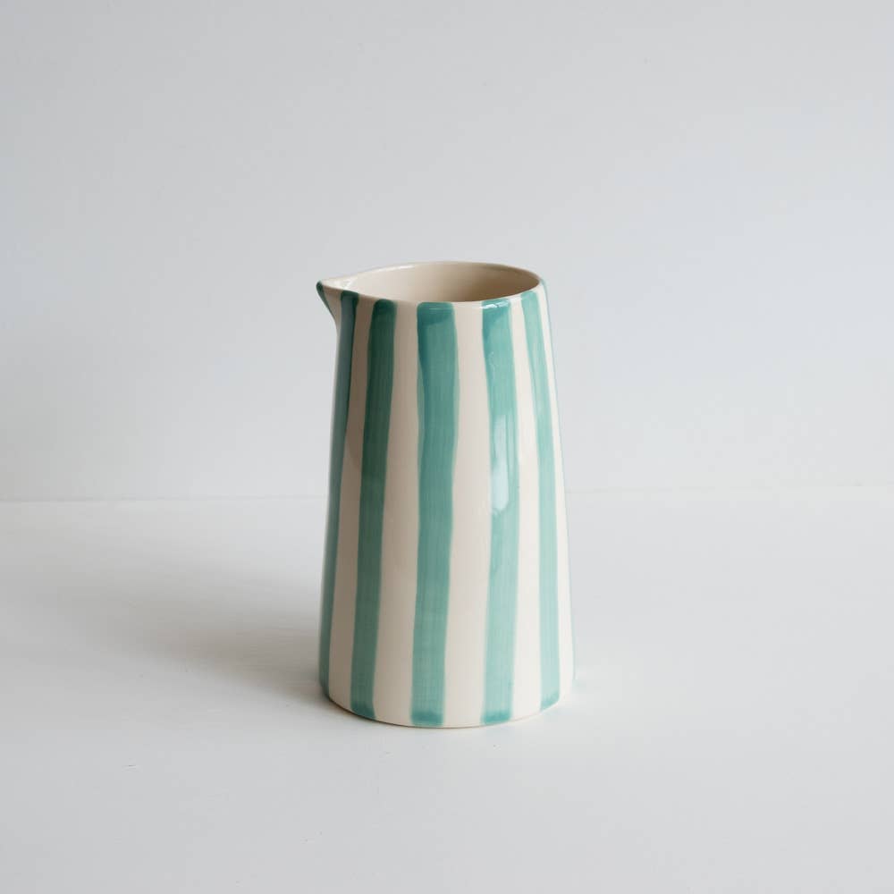Musango handprinted mint & white striped ceramic jug. Each pitcher is handprinted to the lines may not be completely straight, adding to the charm of the piece.