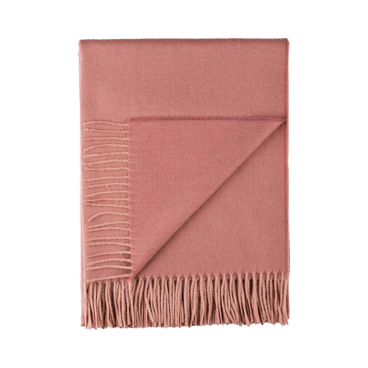 Pink Alpaca throw blanket with fringes on a white background